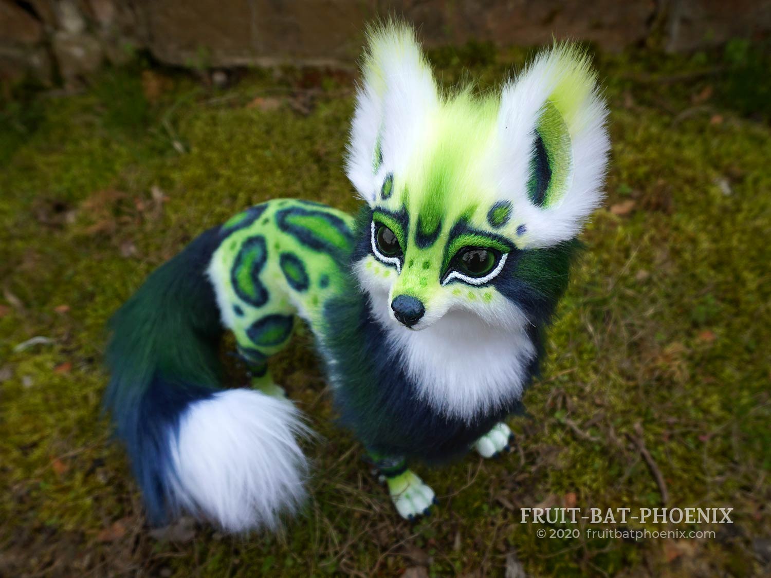 Fantasy fox art doll with blue and green spots