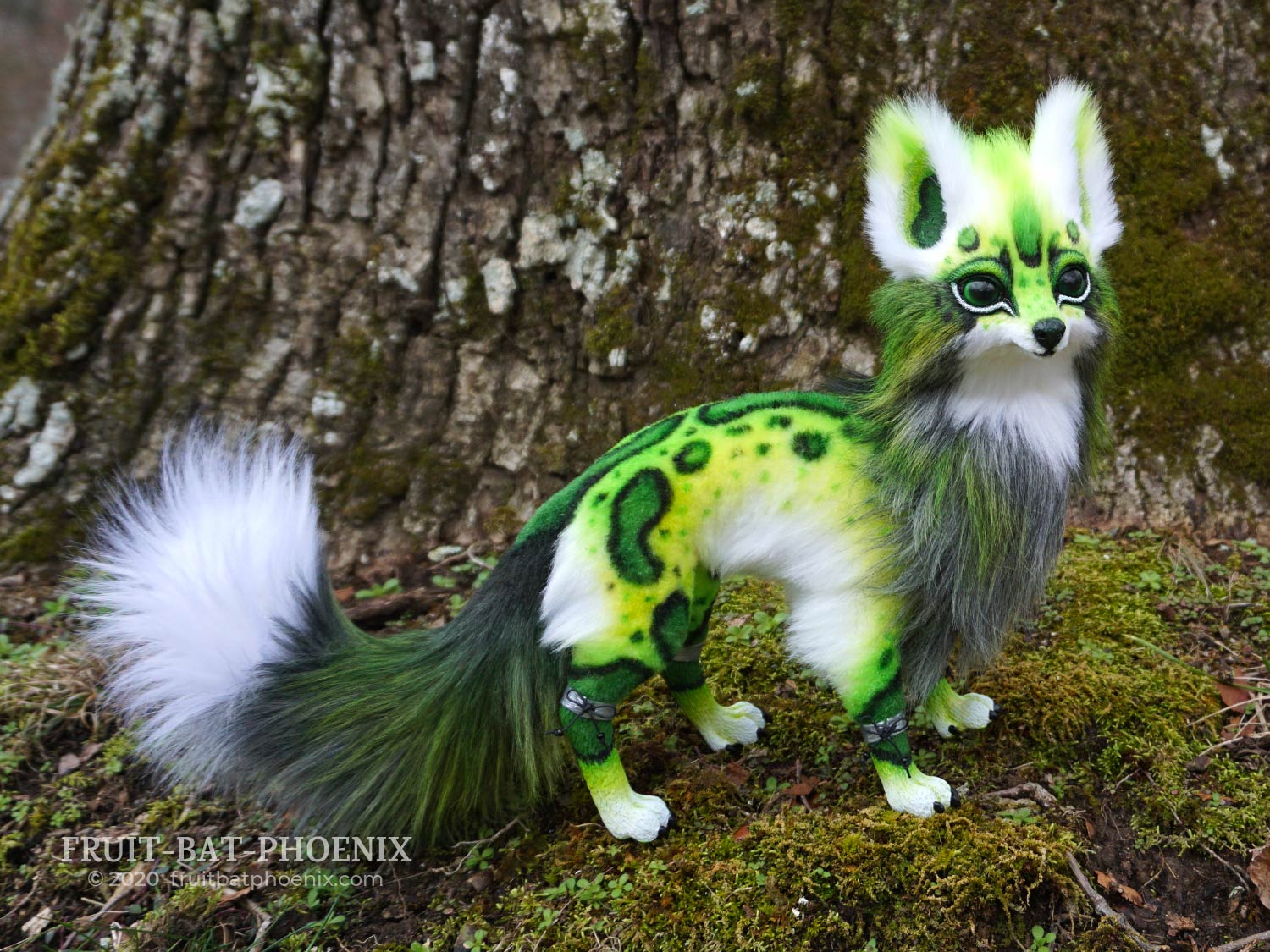 Chlorphyll green spotted fox posable art doll left side view.