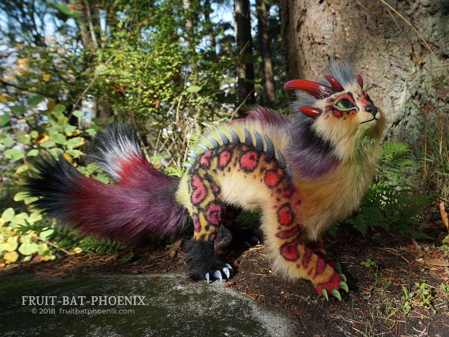 chromatic dragon-cat looking upward