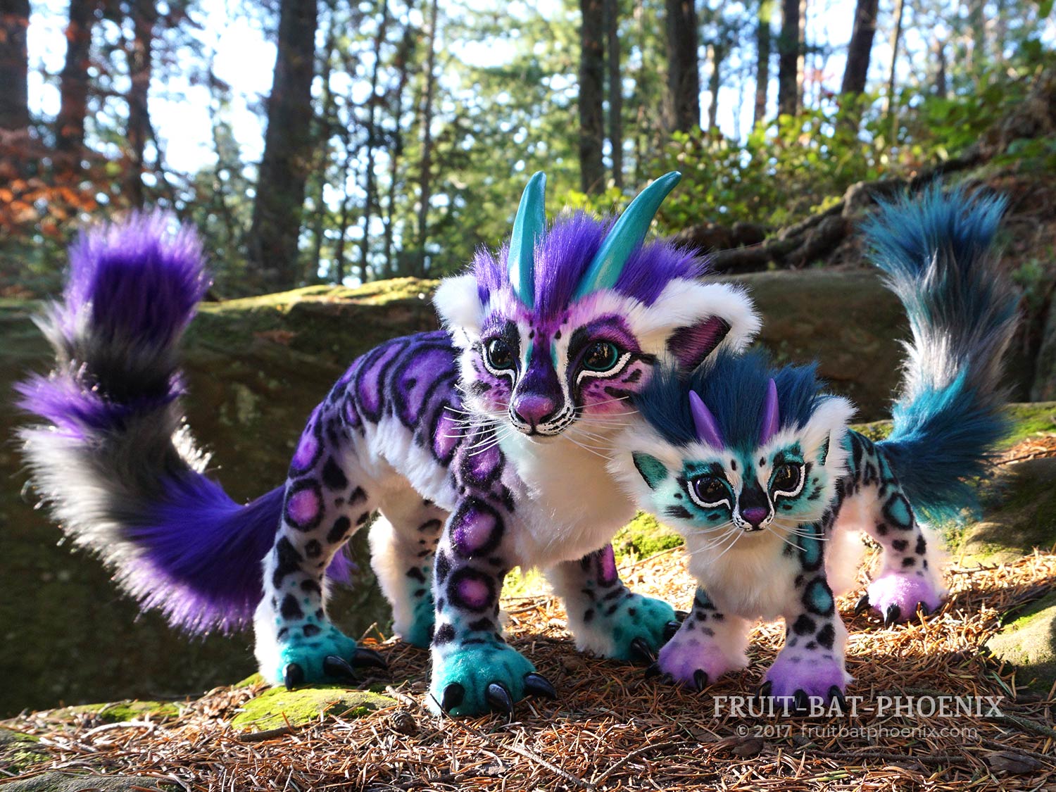 clouded leopard dragons mama and cub front view
