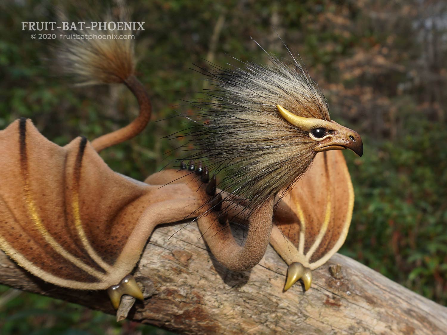 Gold Ochre Eagle Wyrm, a posable dragon art doll, closeup