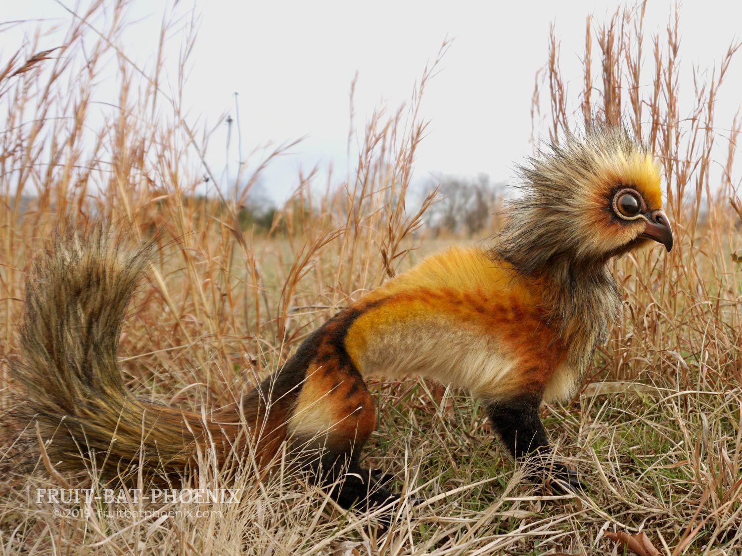 Side view showing full length of the posable fantasy creature's ferret style body and long tail 