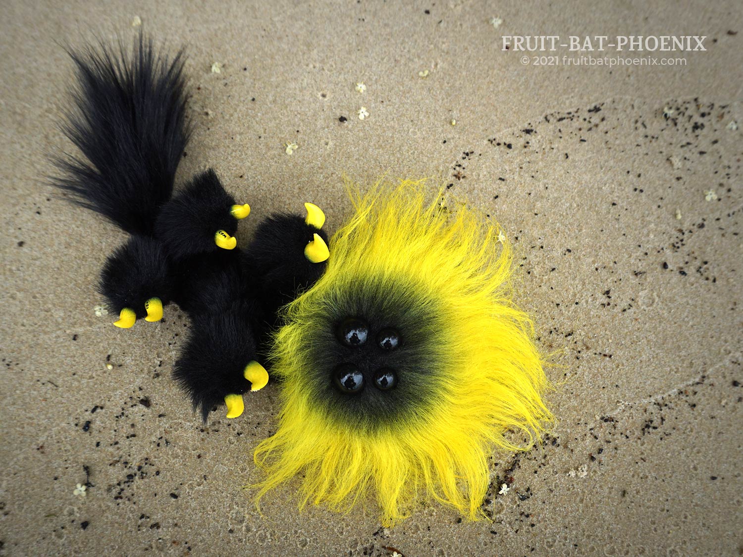 sulfur mmpoff posable art doll laying on its back on sand
