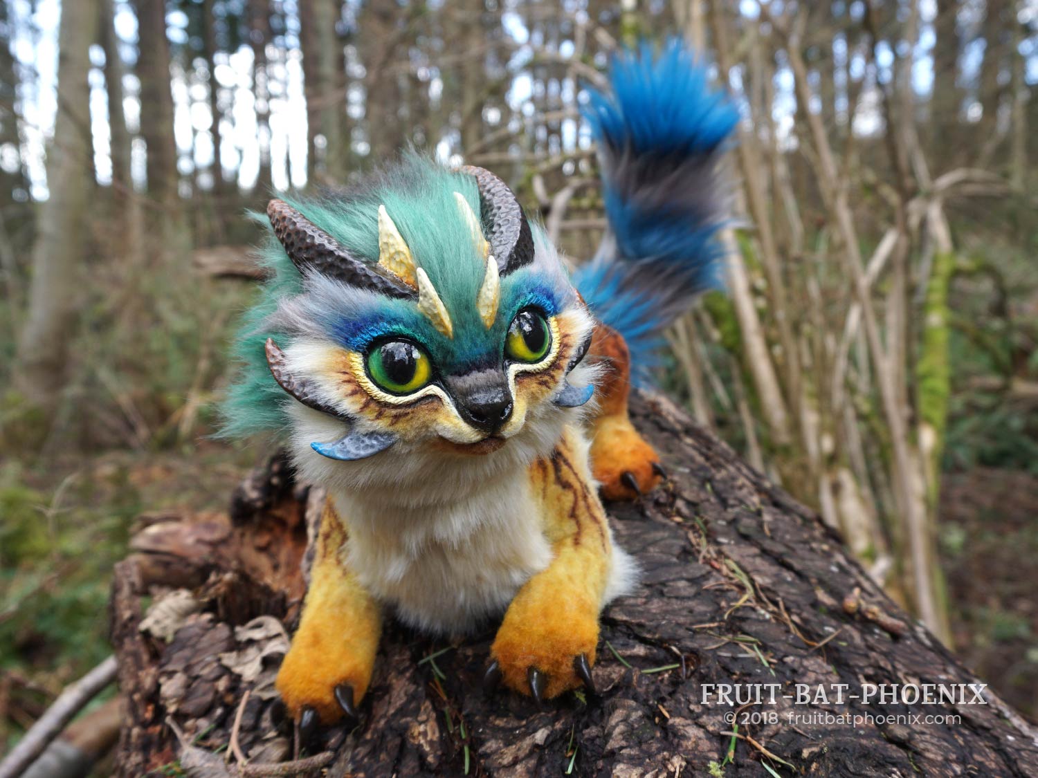 prismatic kitten-dragon front view