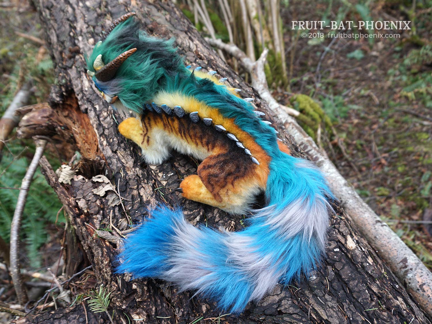 prismatic kitten-dragon top view