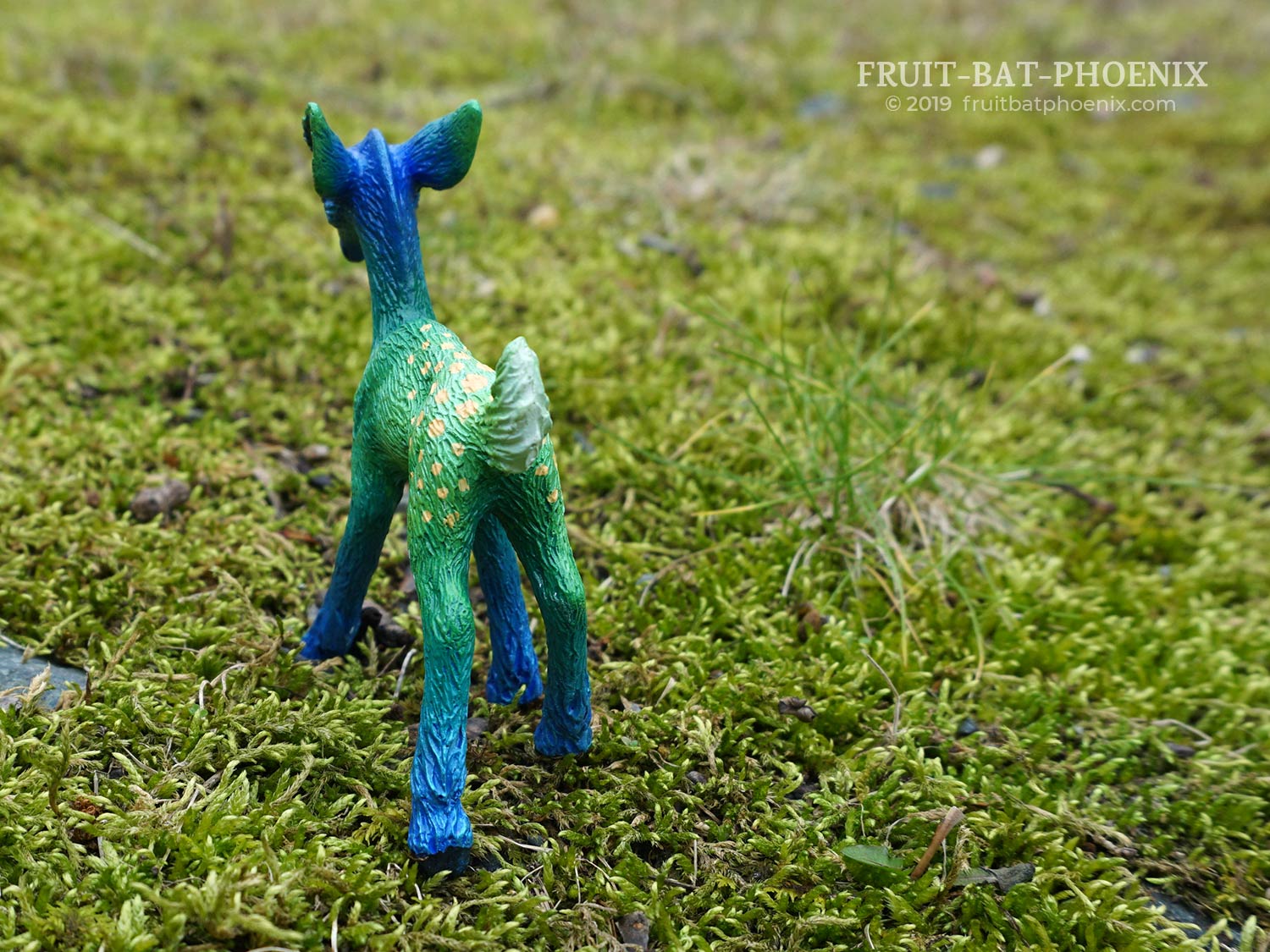 tail and butt of bluegreen resin fawn sculpt
