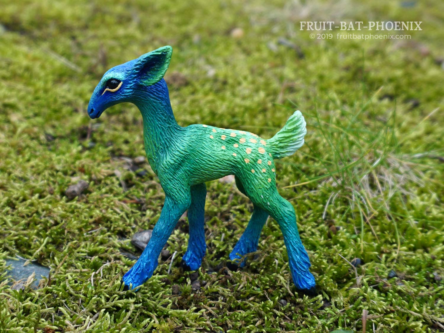side view of bluegreen resin fawn sculpt