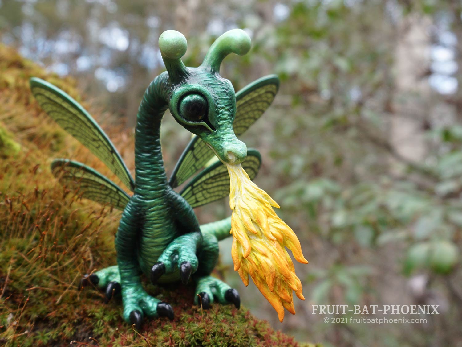 Fire-Breathing Dragon-Fly, a dragon sculpted in polymer clay and paper