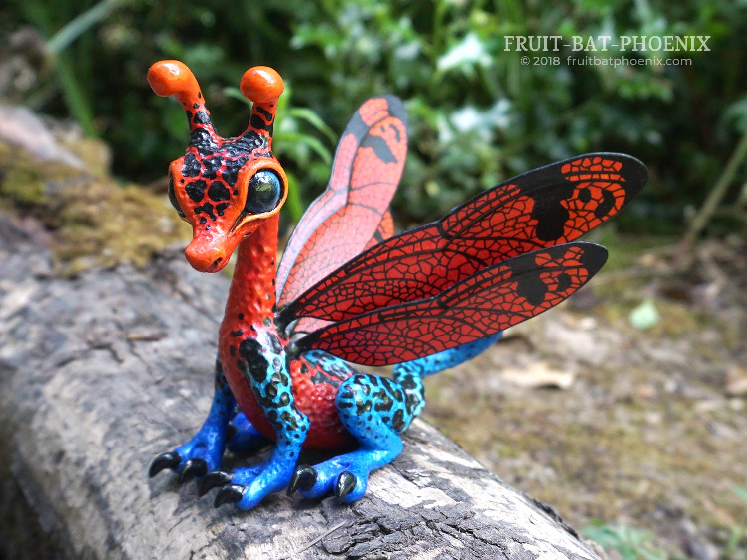 strawberry poison dart dragonfly dragon 3/4 view